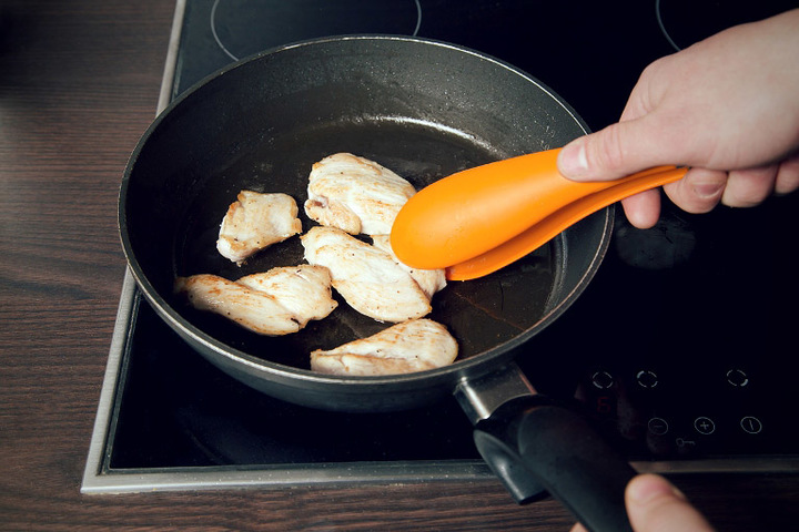 Chicken fillet on a frying pan